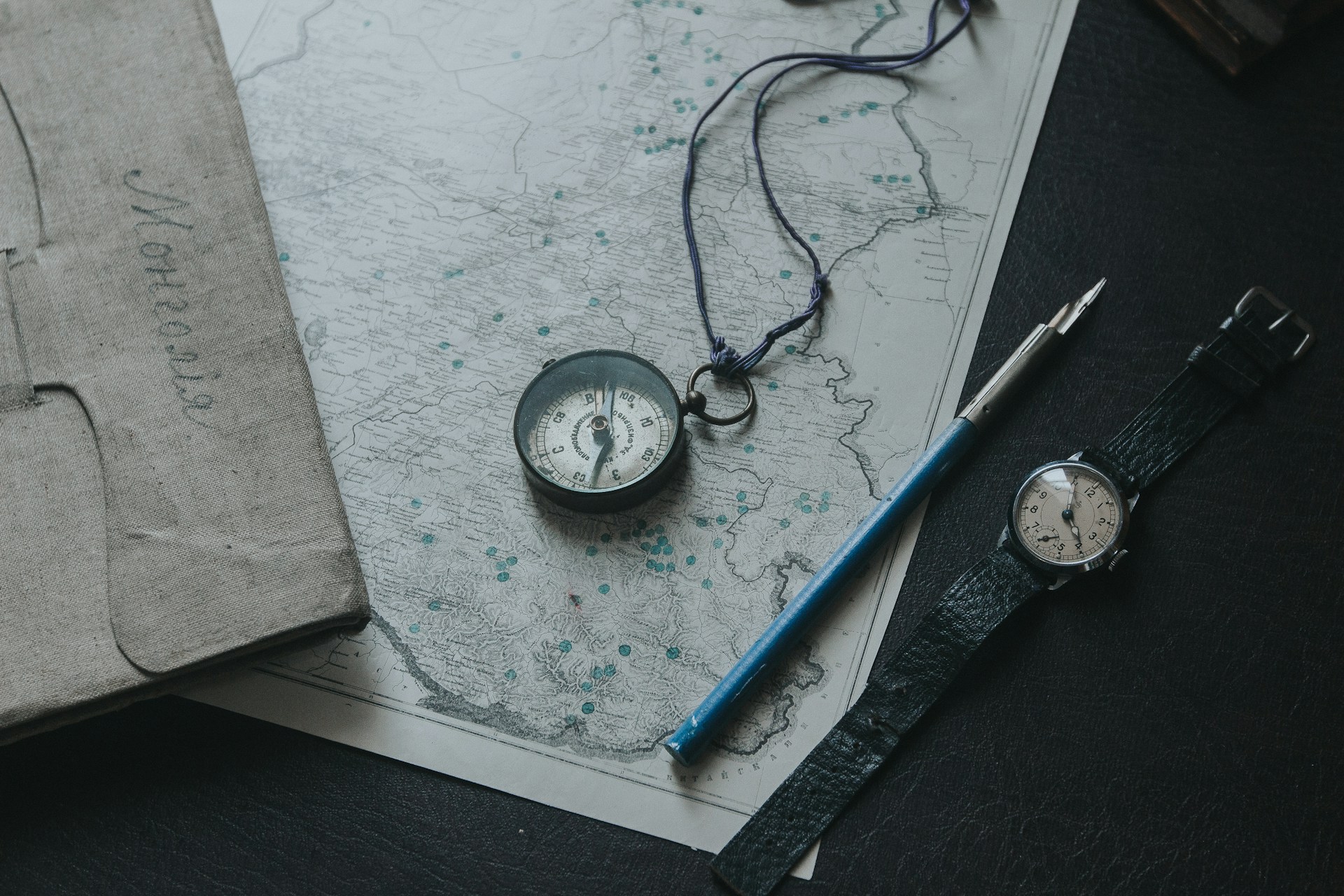 A compass on a vintage map.  Photo by Eugenia Ai on Unsplash.